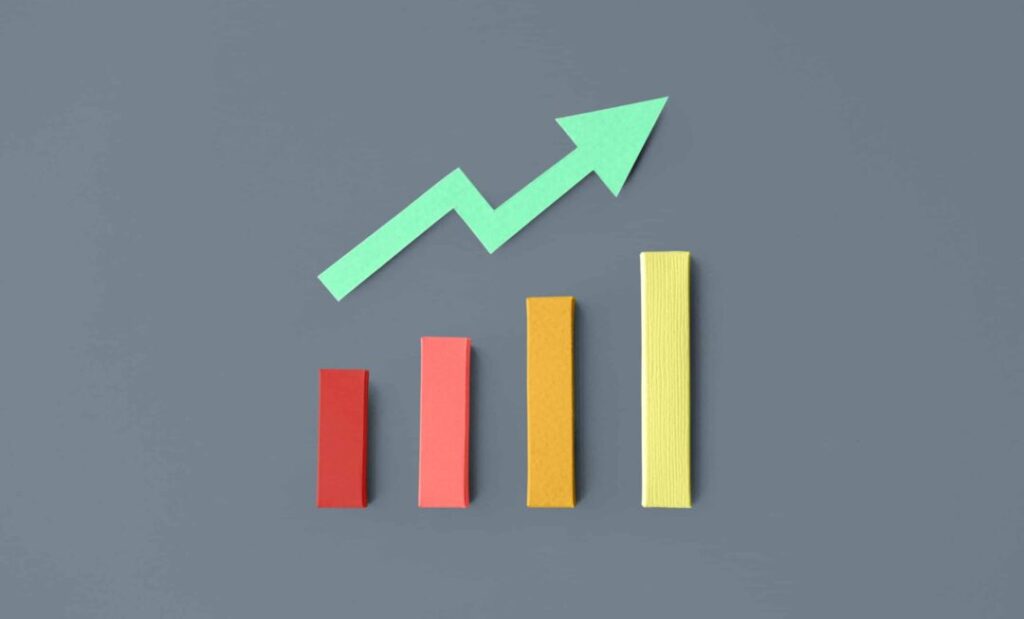 Bar chart with upward arrow symbolizing growth and success in corporate innovation